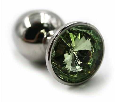 Серебристая алюминиевая анальная пробка с светло-зеленым кристаллом - 8,4 см. Серебристая алюминиевая анальная пробка с светло-зеленым кристаллом - 8,4 см.